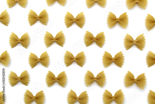 Texture of pasta in the form of a bow on a white background
