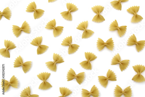 Texture of pasta in the form of a bow on a white background
