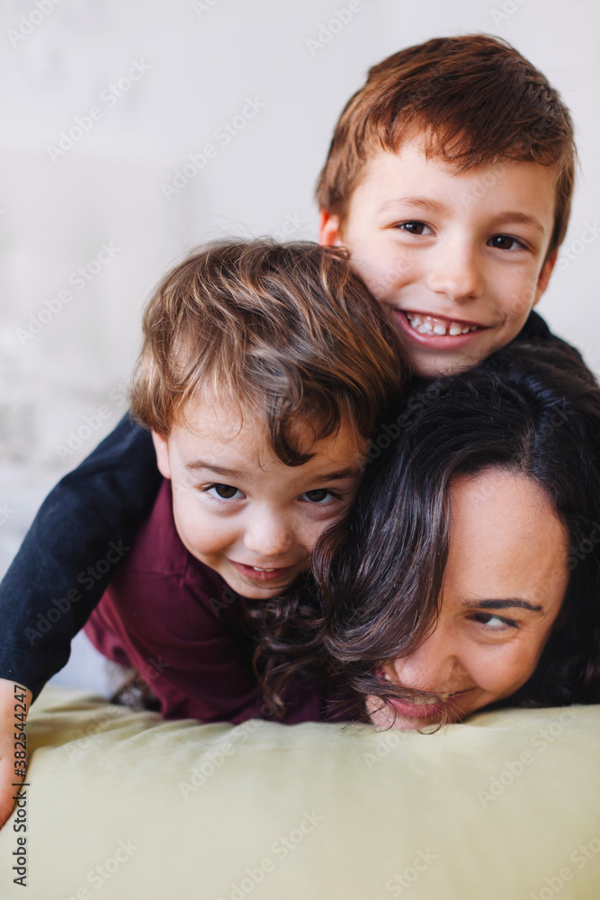 Beautiful family playing together at home. Beautiful family playing together at home.