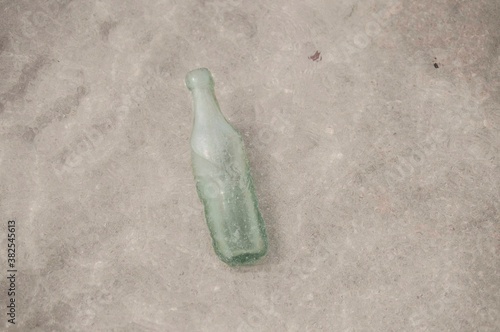 Vintage blue bottle in water