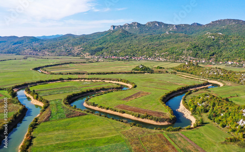 SEPTEMBER, 2020 - Aerial view of river Lika meandering through Donji Kosinj and Lipovo Polje villages in Croatia. photo