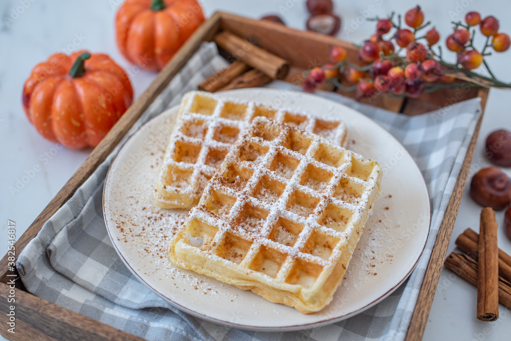 sweet home made pumpkin spice waffles on a table sweet home made pumpkin spice waffles on a table