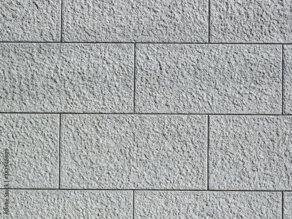 Naklejka premium 石のタイルの外壁