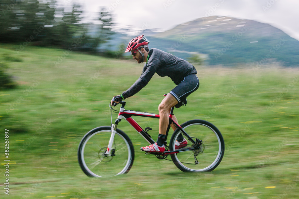 Man Riding a Mountain Bike Man Riding a Mountain Bike