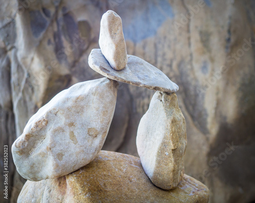Canvas Print Stack of stones and pebbles on the beach