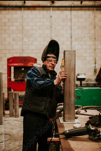 man working in a garage photo