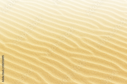 Top view on sand dunes. The texture of sand