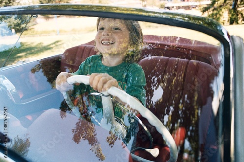 boy and a retro car photo