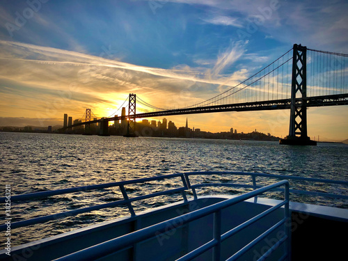 sunset over the bay bridge