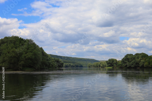 Very beautiful river water surface. Natural green background. photo