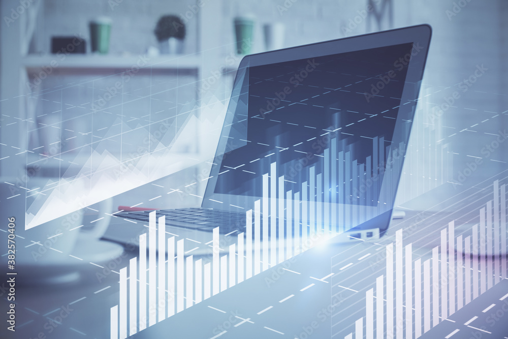 Forex graph hologram on table with computer background. Multi exposure. Concept of financial markets. Forex graph hologram on table with computer background. Multi exposure. Concept of financial markets.