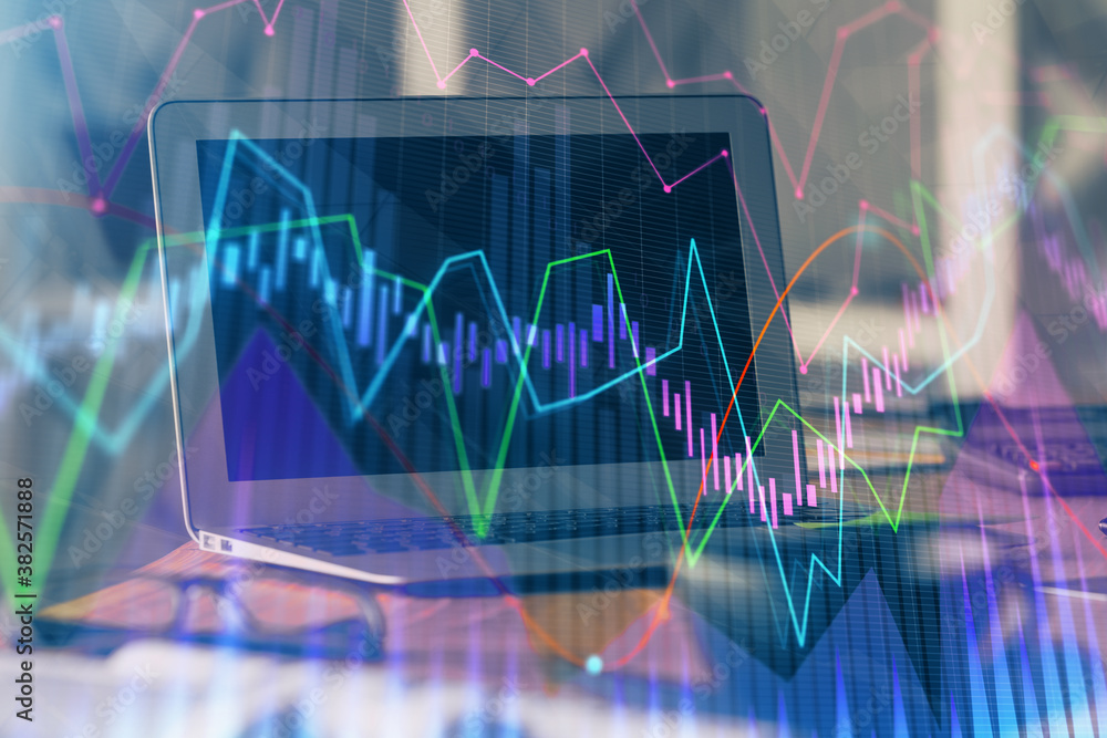 Stock market graph and table with computer background. Double exposure. Concept of financial analysis. Stock market graph and table with computer background. Double exposure. Concept of financial analysis.