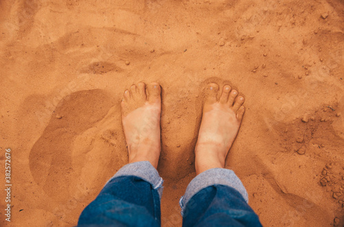 Feet in red outback dirt photo