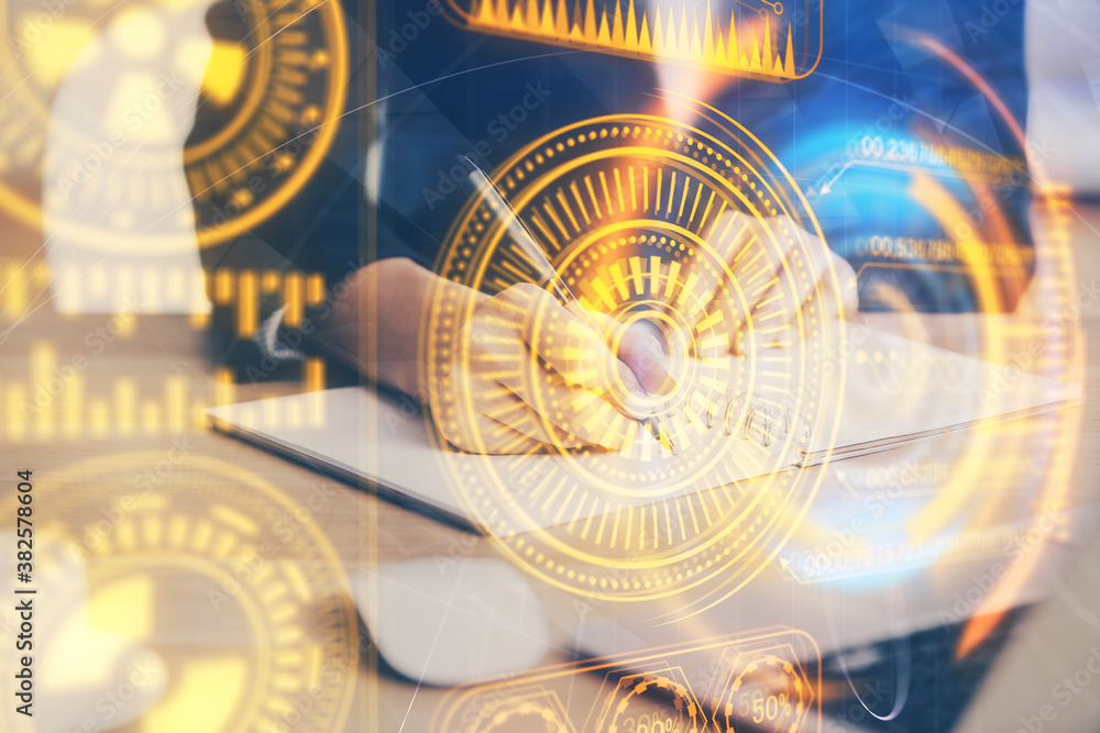 Fototapeta premium Tech theme hologram over woman's hands taking notes background. Concept of hightech. Double exposure