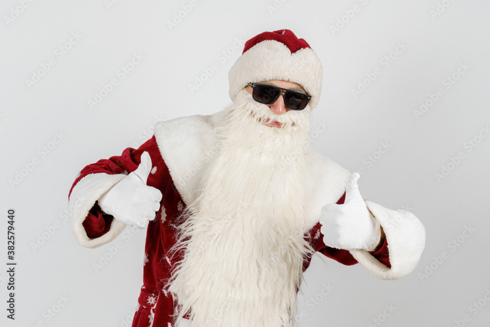Santa Claus shows with two hands a gesture - class. Isolated background.