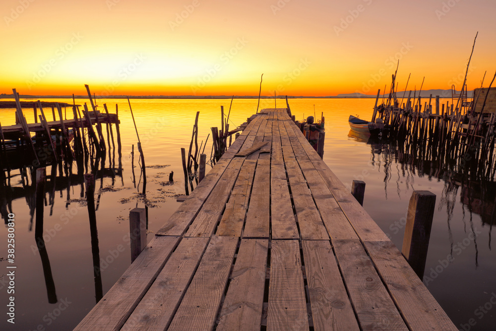 Fototapeta premium Sunset at the Palafitical Port of Carrasqueira, Alentejo Portugal