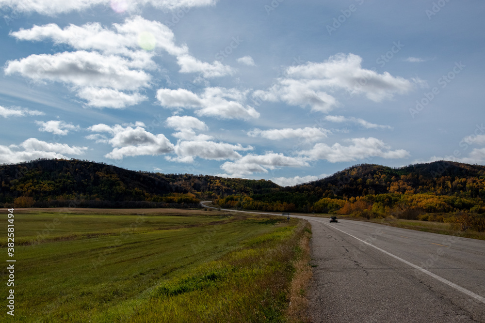 Back country road on the Canadian prairies in fall.