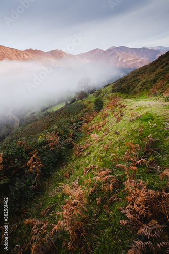 Mountain road with fog in the background