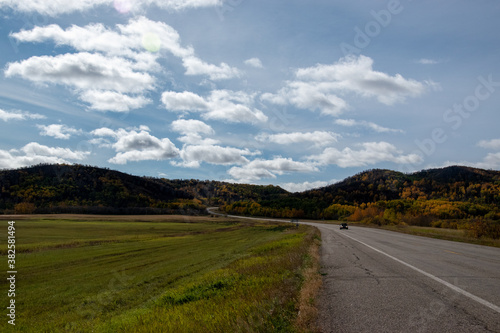 Back country road on the Canadian prairies in fall. © royalkangas