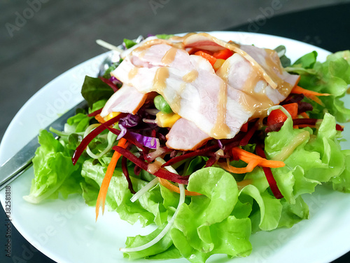 Close up vegetable salad and hamcheese photo