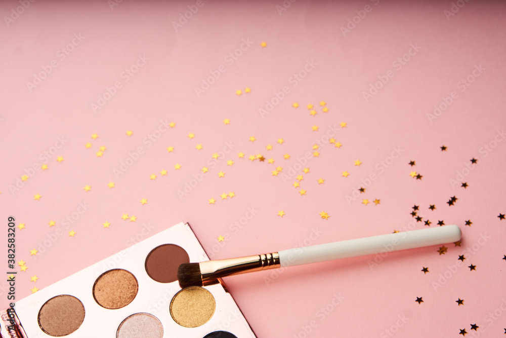 makeup brushes and eyeshadow professional cosmetics on pink background makeup brushes and eyeshadow professional cosmetics on pink background