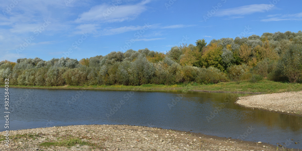 Autumn fishing on the river, beautiful panorama.
