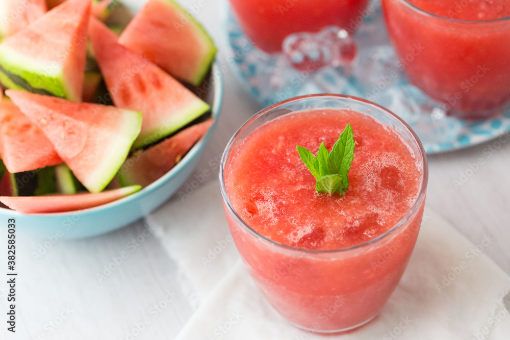 Glass of watermelon cooler drink with mint Glass of watermelon cooler drink with mint