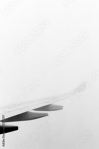 Airplane flying through clouds