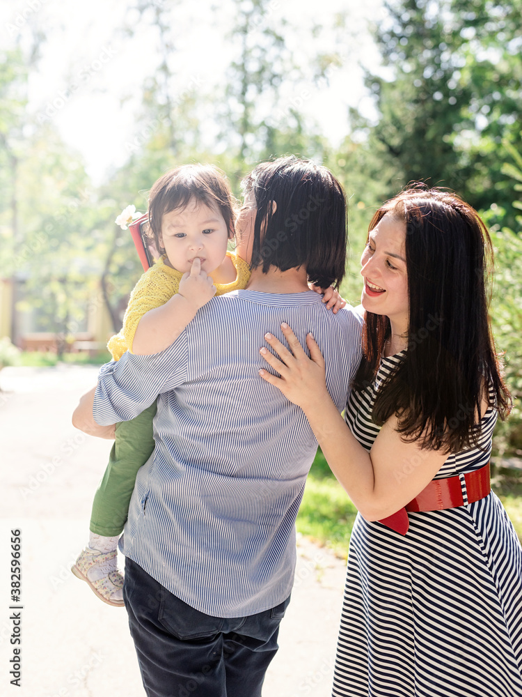 Obraz premium A multi generation portrait of a happy grandmother with her daughter and granddaughter