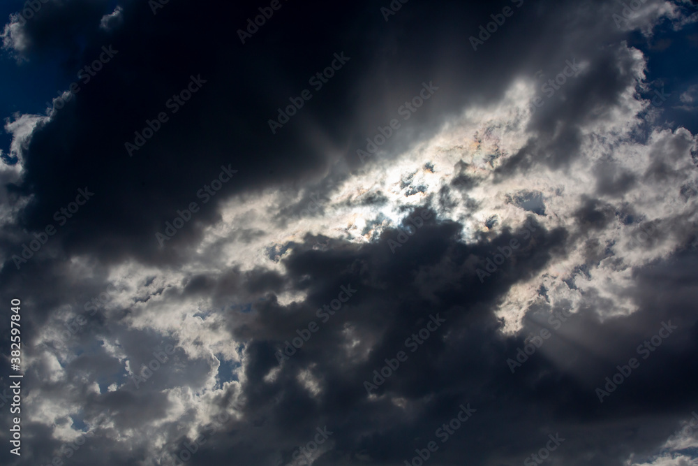 Rays of light reflected through the clouds