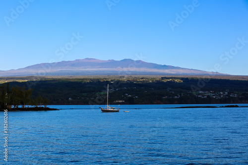 Sunrise at Hilo Bay, Hawaii.  North of the bay runs the Hamakua Coast on the slopes of Mauna Kea,  the highest point in the state of Hawaiʻi and second-highest peak of an island on Earth. 