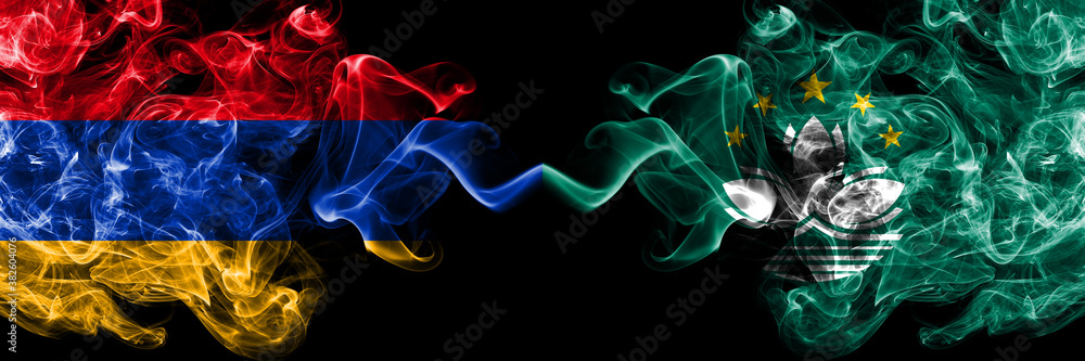 Armenia vs Macau, China smoky mystic flags placed side by side. Thick colored silky abstract smoke flags