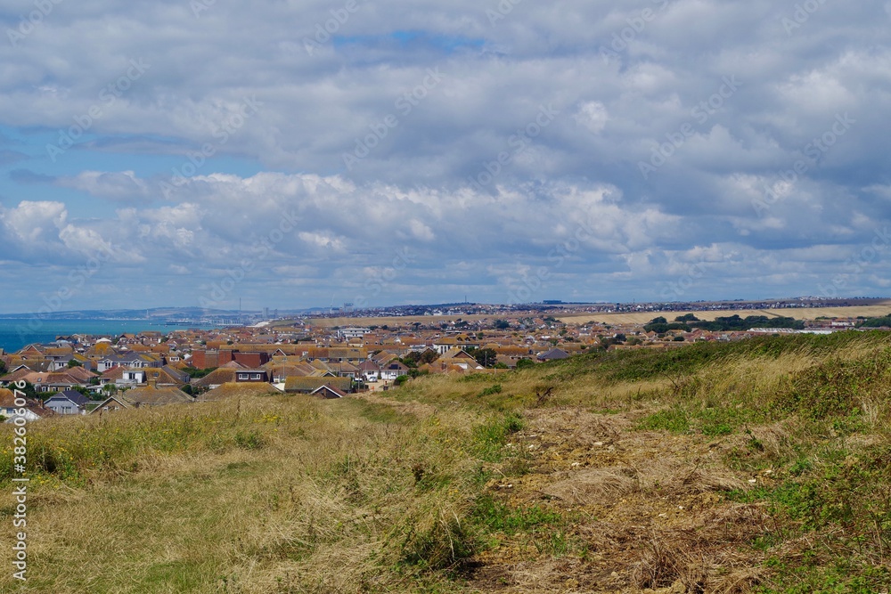 Views of the countryside, summer and a white cloudy skies over Peacehaven and Southdowns National Park, England
