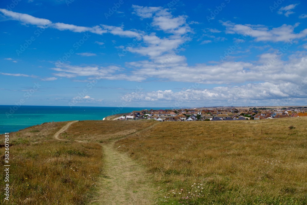 Views of the countryside, summer and a white cloudy skies over Peacehaven and Southdowns National Park, England Views of the countryside, summer and a white cloudy skies over Peacehaven and Southdowns National Park, England