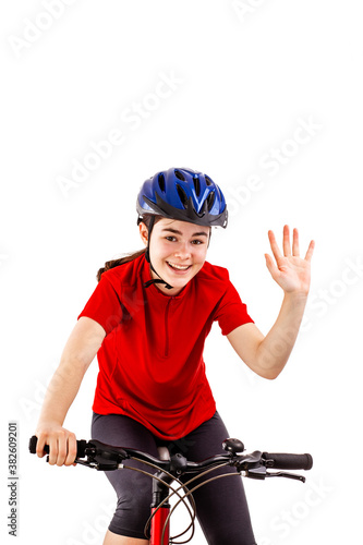 Teenage girl with bicycle isolated on white background
