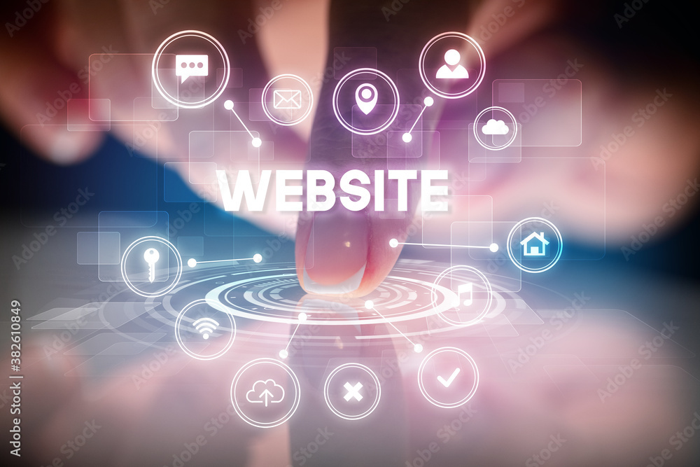 Finger touching tablet with web technology icons and WEBSITE inscription, web technology concept Finger touching tablet with web technology icons and WEBSITE inscription, web technology concept