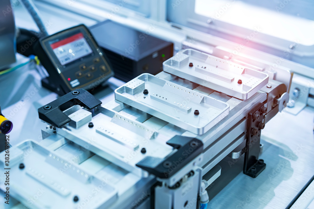intelligence machine working in mobile phone factory,Smart factory industry 4.0 concept. intelligence machine working in mobile phone factory,Smart factory industry 4.0 concept.