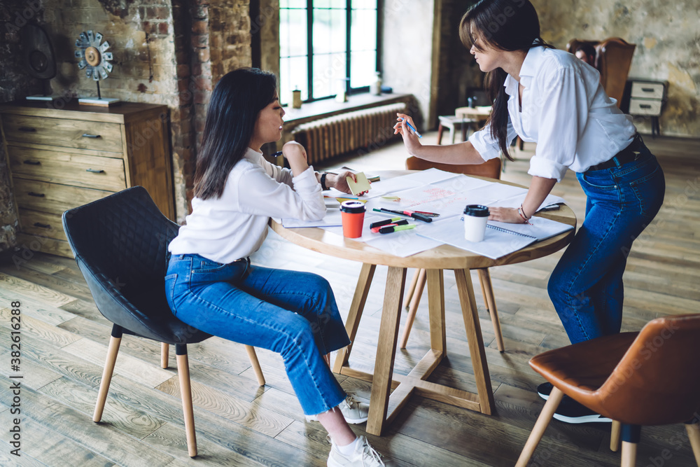 Fototapeta premium Concentrated colleagues having meeting in workspace