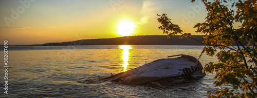 Michigan Beach Shipwreck Sunrise Panorama. Sunrise over a shipwreck on the Pictured Rocks National Lakeshore on the  coast of Lake Superior.