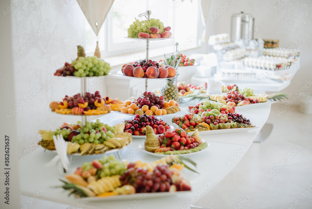 Different variety of fresh fruits on the buffet table at the celebration