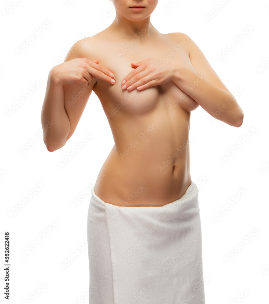 Woman examining breast isolated on white background
Woman examining breast isolated on white background