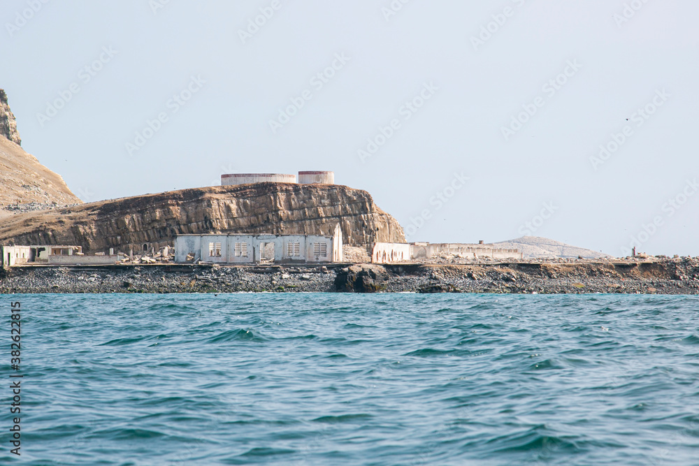 Jail destroyed by bombing on Fronton Island. Prison for terrorists and political prisoners during the dictatorship in Peru. Former prison on an island in the Pacific Ocean.