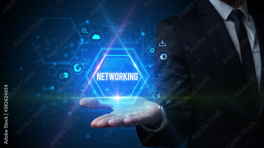 Man hand holding NETWORKING inscription, social media concept Man hand holding NETWORKING inscription, social media concept