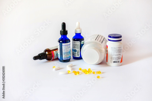 Medicine pills. Tablets, blister capsules, glass vials of liquid medicines and plastic test tubes with caps.