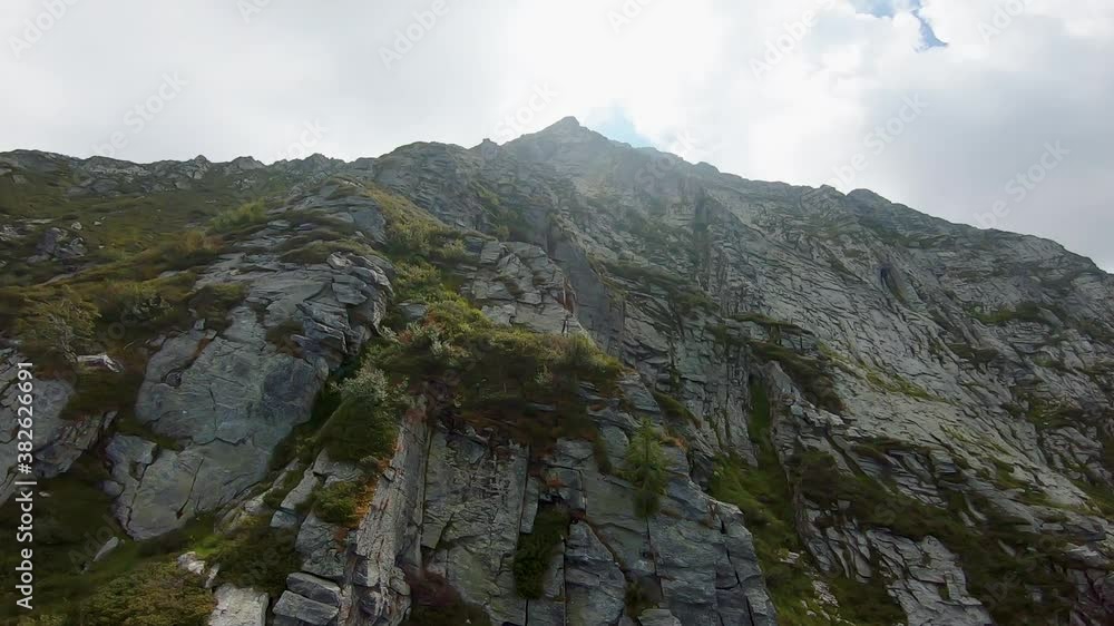Mountain drone climb , cross on top Mountain drone climb , cross on top
