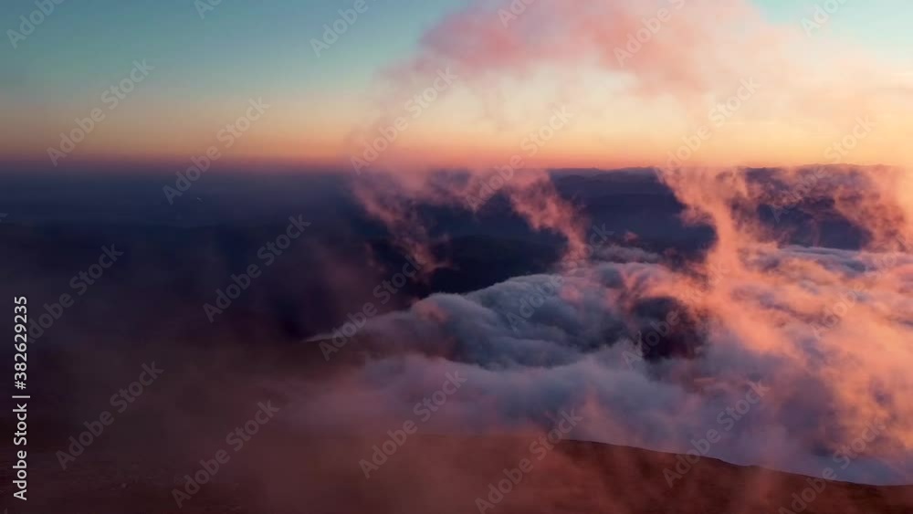 Amazing sunset from the top of the mountains with fog in autumn season aerial video Amazing sunset from the top of the mountains with fog in autumn season aerial video