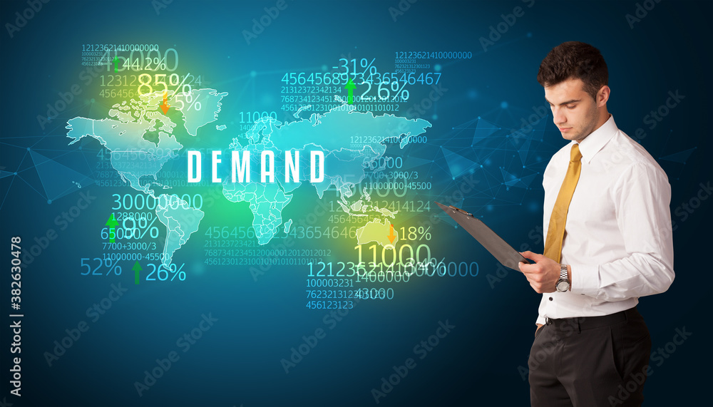 Businessman in front of a decision with DEMAND inscription, business concept Businessman in front of a decision with DEMAND inscription, business concept