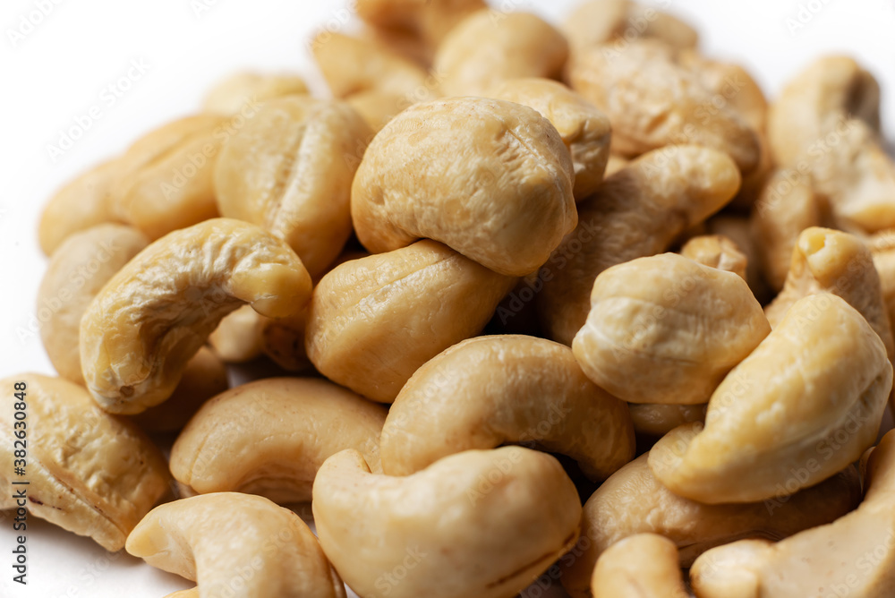 cashew nuts on a white background cashew nuts on a white background