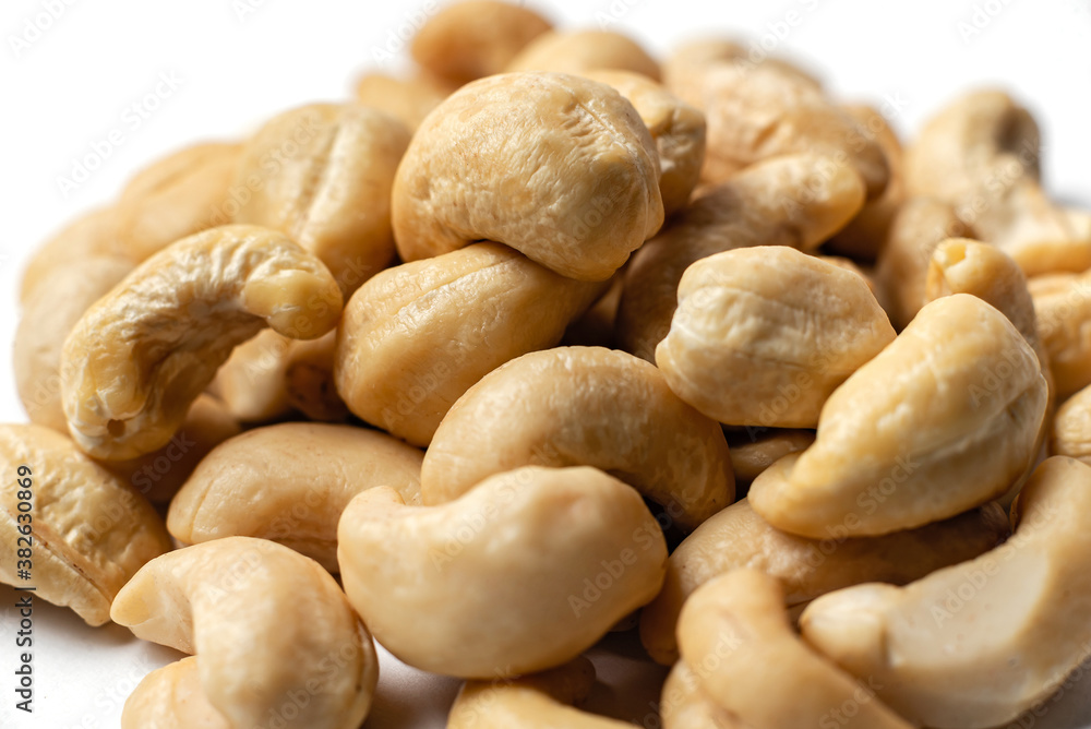 cashew nuts on a white background cashew nuts on a white background