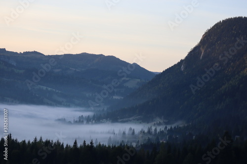 Morning fog in the Carpathians mountains, landscape, Red Lake area, Romania